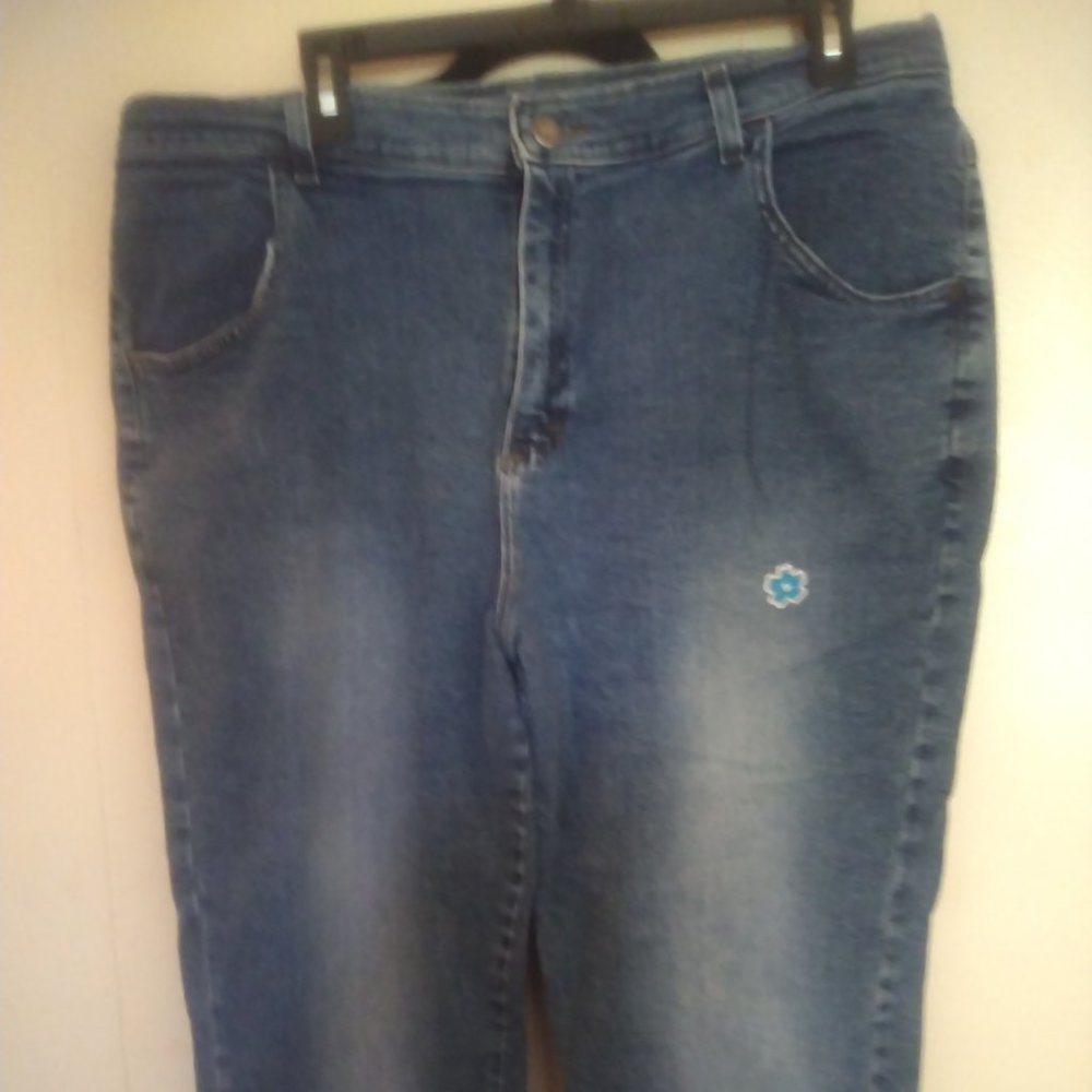 Blue jean capris with flower patch